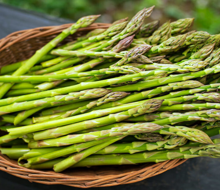 fresh green asparagus in a basket