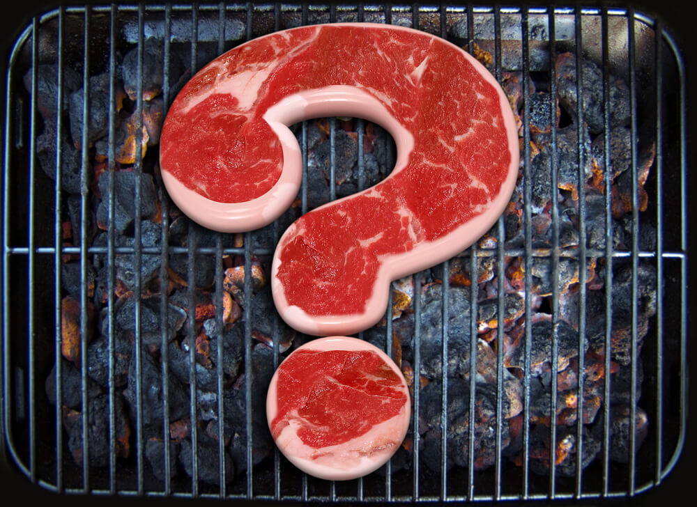 question mark shaped steak on grill conceptual