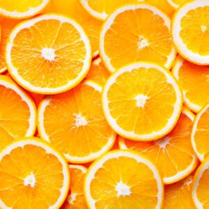sliced oranges overhead view background