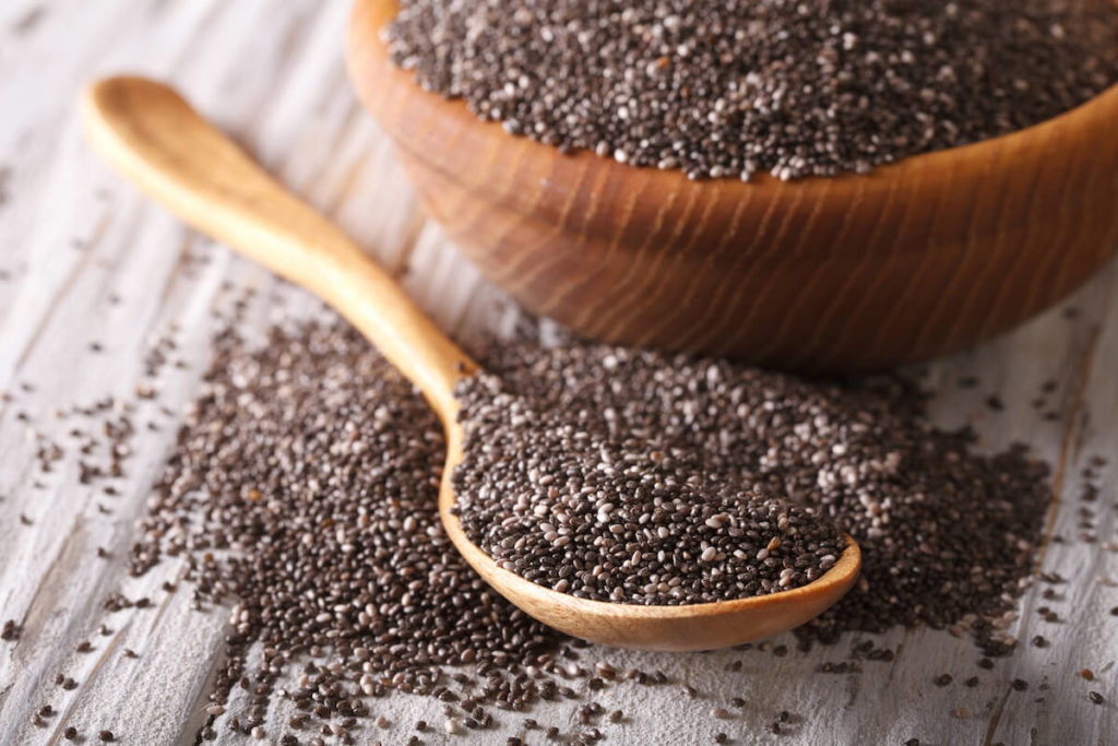 chia seeds on wooden background