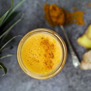 Pineapple, carrot and banana smoothie with ginger and turmeric