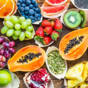 Fruits, berries, nuts, seeds top view.Healthy, detox superfood concept.