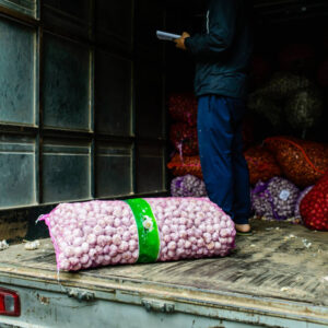 garlic bag on delivery truck at market, transport goods