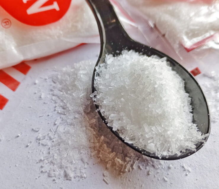 MSG in details. Monosodium glutamate or vetsin, a flavor enhancer that's added to many foods. It's the sodium salt of glutamic acid, an amino acid that occurs in the taste naturally.