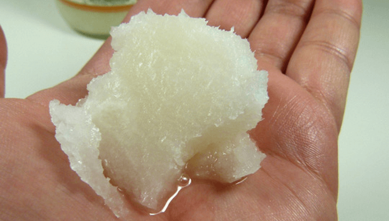 A lump of hardened coconut oil exposed to air
