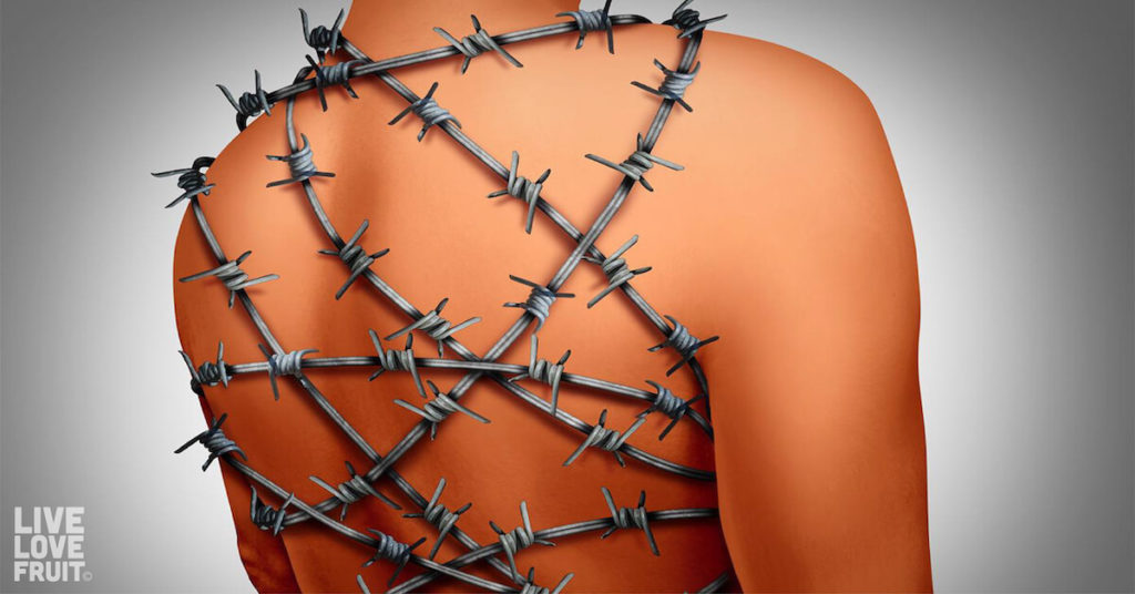human body wrapped in barbed wire to demonstrate the pain of chronic inflammation