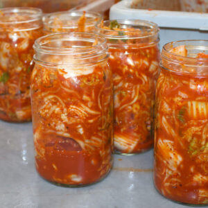A vegetable kimchi fill with jar